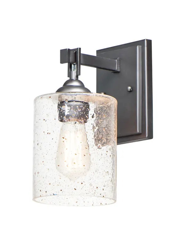 Stone Seeded glass shades with flecks of gold, suspend from a squared loop that cradles a rectangular tube arm finished in a soft Bronze. The minimalistic frame is a perfect complement to the rustic glamour of this glass.