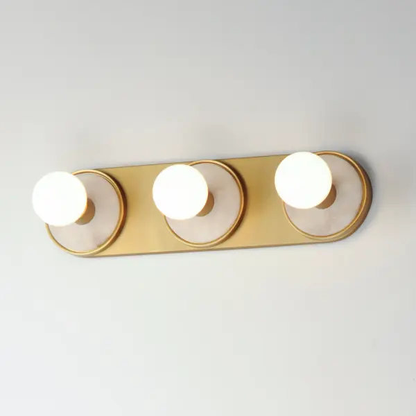 Hollywood Three Light Vanity Sconce in Spanish Alabaster and Natural Aged Brass - Image 4