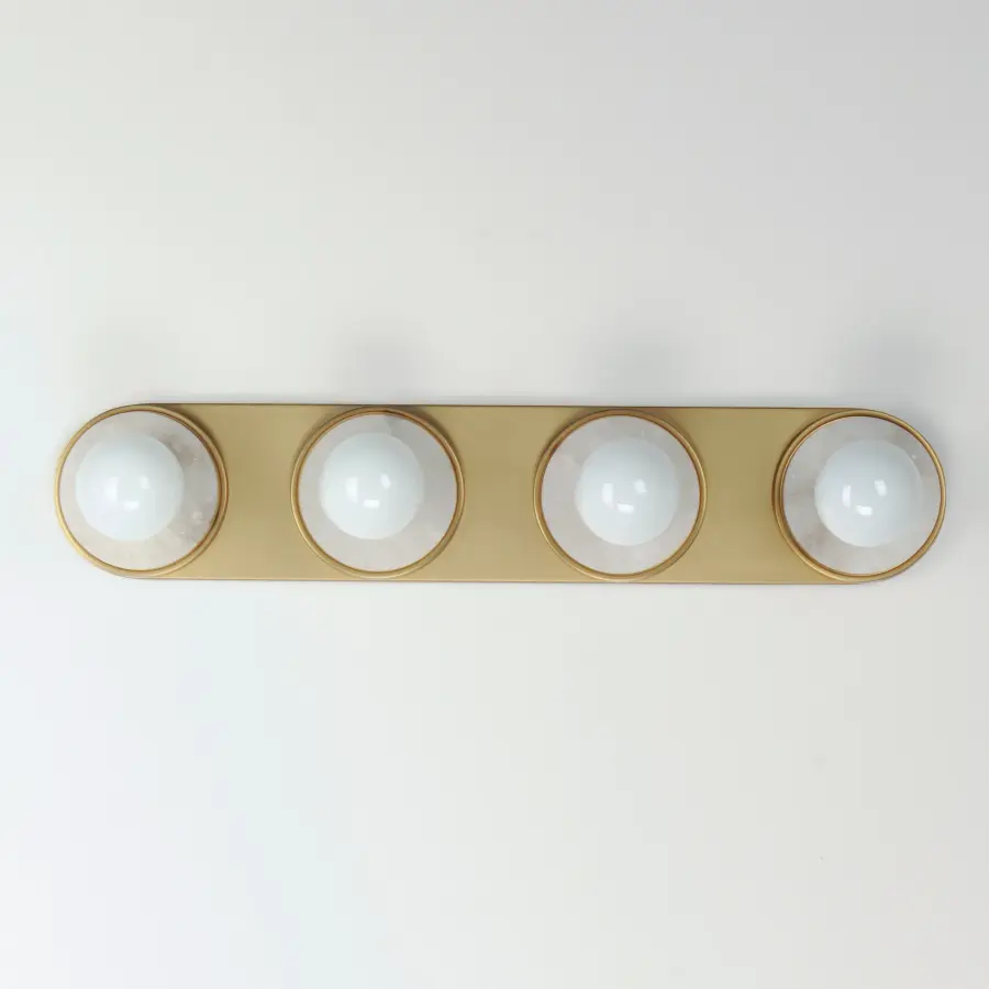Hollywood Four Light Vanity Sconce in White Alabaster and Natural Aged Brass - Image 2