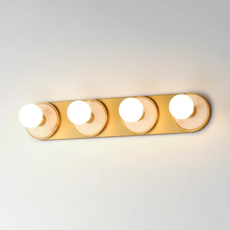 Hollywood Four Light Vanity Sconce in White Alabaster and Natural Aged Brass - Image 4
