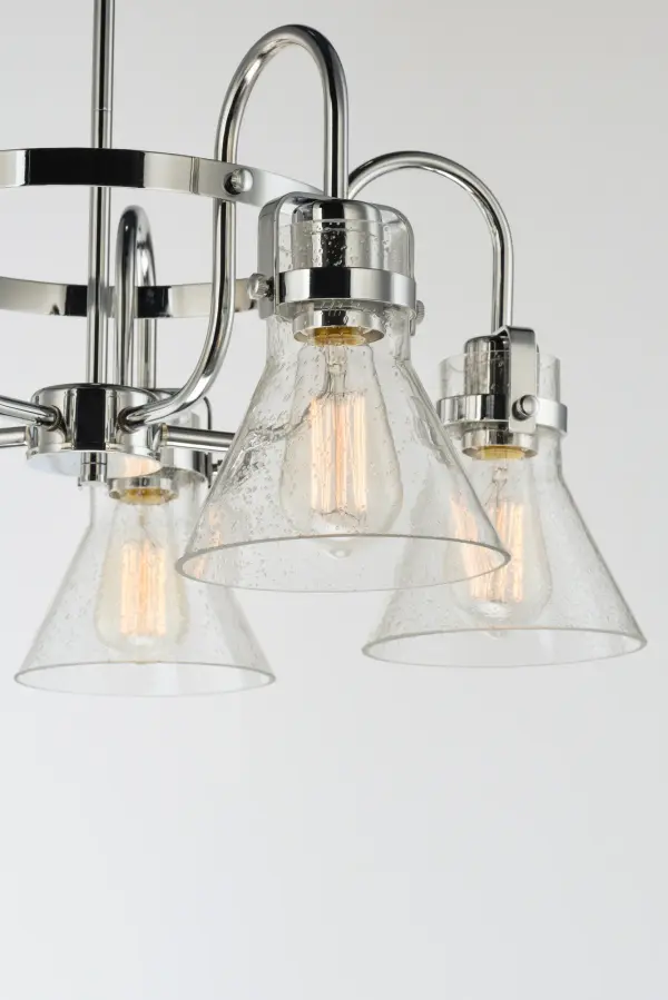 This nautical-inspired collection features Clear Seedy glass cones suspended by a yoke frame. The clear glass offers abundant lighting and compliments the styling of the fixture. Make it a more industrial look by adding filament E26 light bulbs. - alternate view