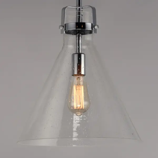 This nautical-inspired collection features Clear Seedy glass cones suspended by a yoke frame. The clear glass offers abundant lighting and compliments the styling of the fixture. Make it a more industrial look by adding filament E26 light bulbs. Collection: Seafarer Finish: Polished Chrome Glass: Seedy Width: 14.00" Height: 15.75" Length: 14.00" Weight: 6.84 lb Wire: 120" Canopy: 5"x5"x1" Number of Bulbs: 1 Maximum Wattage: 60.00 W Bulb Type: A19 Bulb Base: E26 Medium Light Source: Incandescent Dimmable Voltage: 120.00 V Material: Steel, Glass Safety Listing: cULus Safety Rating: Dry Spec Sheet Instructions Parts Diagram - alternate view