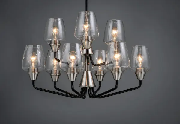 Simple yet elegant frames are finished in two tone finishes to add upscale element to this economical collection. Frames are available in either Bronze with Antique Brass accents or Black with Satin Nickel accents. Both are supplied with Clear glass shades inspired by stemware for a tailored profile. - alternate view