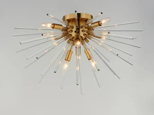 A dazzling burst of Clear glass rods extend from a classic sputnik shape finished in a bright Polished Chrome or warm Satin Brass. Available in two sizes of pendants and as a ceiling fixture, this unique look is a statement piece designed to attract attention. Collection: Polaris Finish: Satin Brass Glass: Clear Width: 25.00" Height: 14.00" Length: 25.00" Weight: 6.60 lb Wire: 120" Canopy: 6"x6"x0.75" Number of Bulbs: 8 Maximum Wattage: 60.00 W Bulb Type: B11 Bulb Base: E12 Candelabra Light Source: Incandescent Dimmable Voltage: 120.00 V Material: Steel+Glass Safety Listing: cETLus Safety Rating: Dry Spec Sheet Instructions Parts Diagram - alternate view