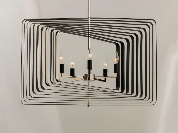 A fun and unique design the features numerous concentric rings finished Black on the outside and Gold on the inside that pivot from a center point. The rings can be configured from completely flat to full repeated symmetry and anything in between to allow flexibility in the design. Collection: Radial Finish: Polished Nickel / Black Width: 30.00" Height: 20.75" Length: 30.00" Weight: 21.34 lb Wire: 120" Canopy: 5"x5"x0.75" Number of Bulbs: 5 Maximum Wattage: 60.00 W Bulb Type: B10 Bulb Base: E12 Candelabra Light Source: Incandescent Dimmable Voltage: 120.00 V Material: Steel Safety Listing: cULus Safety Rating: Dry Manufacturer Warranty: 1 Spec Sheet Instructions Parts Diagram - alternate view