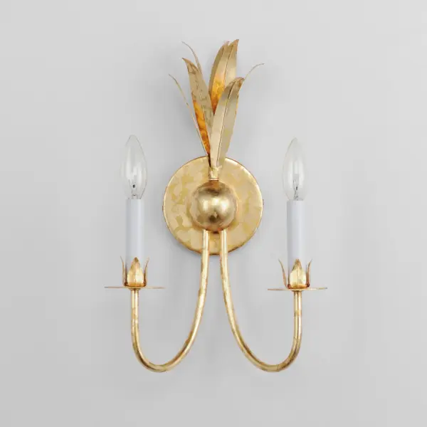 Effortlessly elegant, the biophilic design details that adorn this classic chandelier transport you to an oasis indoors. The design, whether brilliantly gilt in Gold Leaf or hand painted in a textured Anthracite finish, exudes a timeless quality that is sure to please. The graceful form of the chandeliers is constructed of slender metal tubes that sprout from a spherical collector at the center and Off-White metal candle covers. Coordinating Wall Sconces, Pendants and Flush Mount feature matching leaf clusters that allow for coordinating applications throughout the home. Collection: Paloma Finish: Gold Leaf Width: 10.25" Height: 15.75" Weight: 2.42 lb Extension from Wall: 6.00" Wire: 120" Canopy: 4.75"x4.75" Number of Bulbs: 2 Maximum Wattage: 60.00 W Bulb Type: B10 - C10 Bulb Base: E12 Candelabra Light Source: Incandescent Dimmable Voltage: 120.00 V Material: Steel Safety Listing: cETLus Safety Rating: Damp Spec Sheet Instructions - alternate view