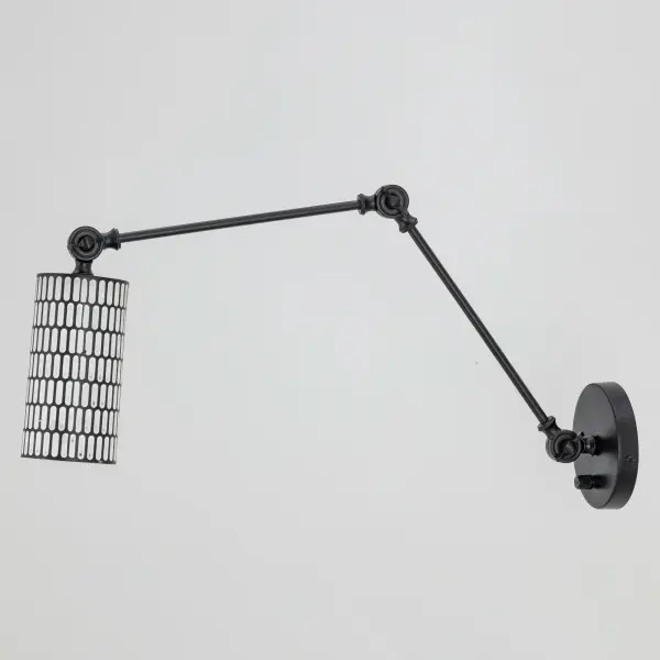 With bold geometry and a globally inspired edge, the Shaka collection makes a statement in simplicity. Each cylindrical drum shade is hand-finished in hammered metal, etched with an elongated oval pattern that adds visual rhythm and soft texture. The light casts downward in warm tones made even more distinct by your choice of two finishes: a striking Black with White contrast or rich Antique Brass. Available in multiple pendant sizes and a swing arm wall sconce, the collection brings a refined, sculptural element to modern interiors. - alternate view