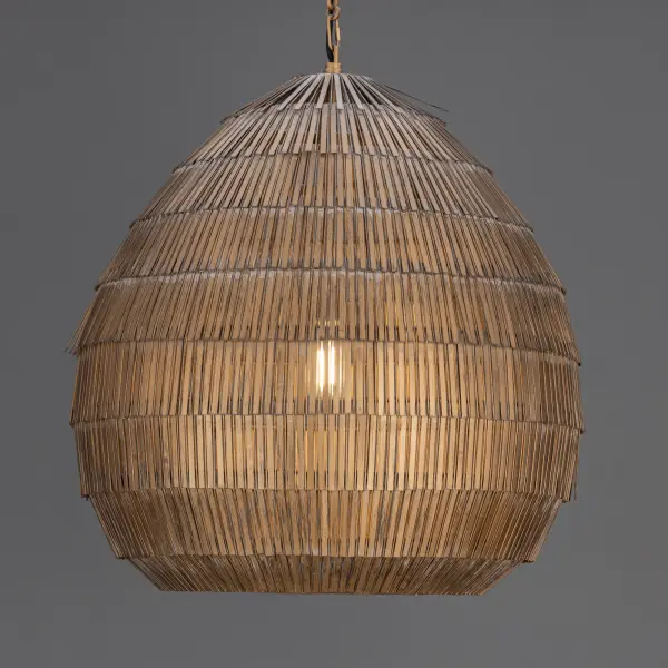 Celebrating artisanal craftsmanship, the Gilda collection offers an elevated, textural presence effortlessly. Strands of hand-strung metal in an Antique Brass finish cascade in concentric layers, adding depth and tonal richness. Suspended from a coordinating decorative chain, the pendant casts a warm, ambient glow that filters through the intricate latticework. With its moody shimmer, the pendants add bold depth and atmosphere to interior spaces. Available in multiple sizes to suit entryways, dining rooms, and beyond. - alternate view