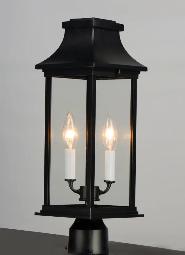 Inspired by classic coach gas lanterns, the Vicksburg collection features die-cast aluminum construction finished in Black with Clear glass. The candle sleeves are done in a contrasting off-white finish to add dimension to the lantern. Available in numerous sizes and configurations including a handsome pocket wall. - alternate view