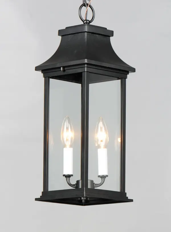 Inspired by classic coach gas lanterns, the Vicksburg collection features die-cast aluminum construction finished in Black with Clear glass. The candle sleeves are done in a contrasting off-white finish to add dimension to the lantern. Available in numerous sizes and configurations including a handsome pocket wall. - alternate view