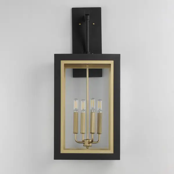 Two-tone frames of Black or White with internal Gold frames provides a neoclassical approach to the squared coach lantern. The sconces jut out from the wall on well-defined trusses that add a contemporary element. Delivering a classic design that suits most exteriors, this collection adds interest in the interior contrasting frame of Gold that secures clear glass panes to diffuse the lamp within. - alternate view