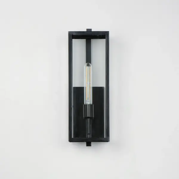 An elongated rectangular shaped design that is both minimalist and industrial. Die cast frames of Dark Bronze support Clear glass panels that provide an unobstructed view of the lantern's interior. Customize with your choice of lamps from vintage to tubular. - alternate view