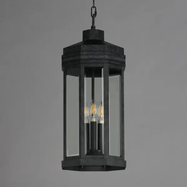 Inspired by the intricate geometric motifs of the iconic architect, the Wright collection of outdoor lighting features a hexagonal frame with tiered louvers along its hood. Beveled at its edges, the Clear glass panes encase the lighting cluster within a robust die cast aluminum body and aluminum frame. Finished in a rich Black Patina, this outdoor series provides thoughtful touches and rich finishes to make a timelessly elegant lighting collection. - alternate view