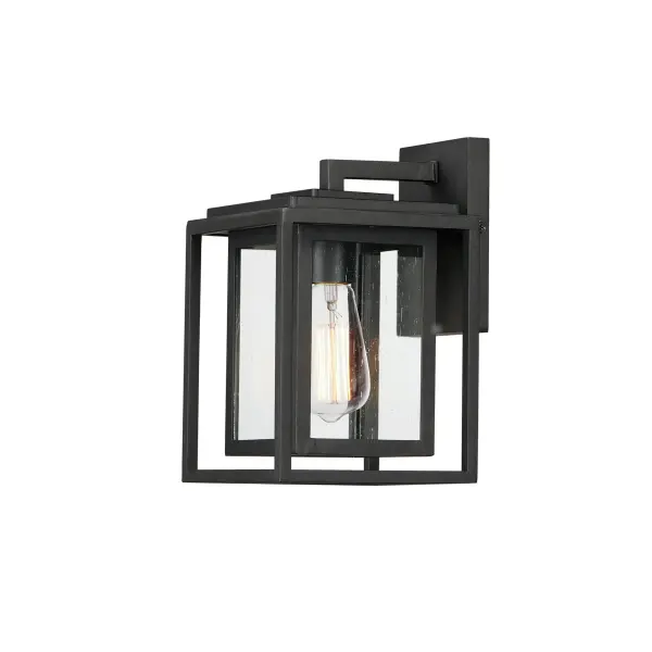A dual framed structure creates dimension on these outdoor lighting fixtures that is both contemporary and transitional. The construction consists of two frames of square tubing and squared components. The inner frame's Clear Seedy glass reduces glare from the light and appears dirt-free for longer periods. This is a comprehensive collection to brighten all areas of your outdoor space, available in various sized sconces as well as hanging and post configurations.