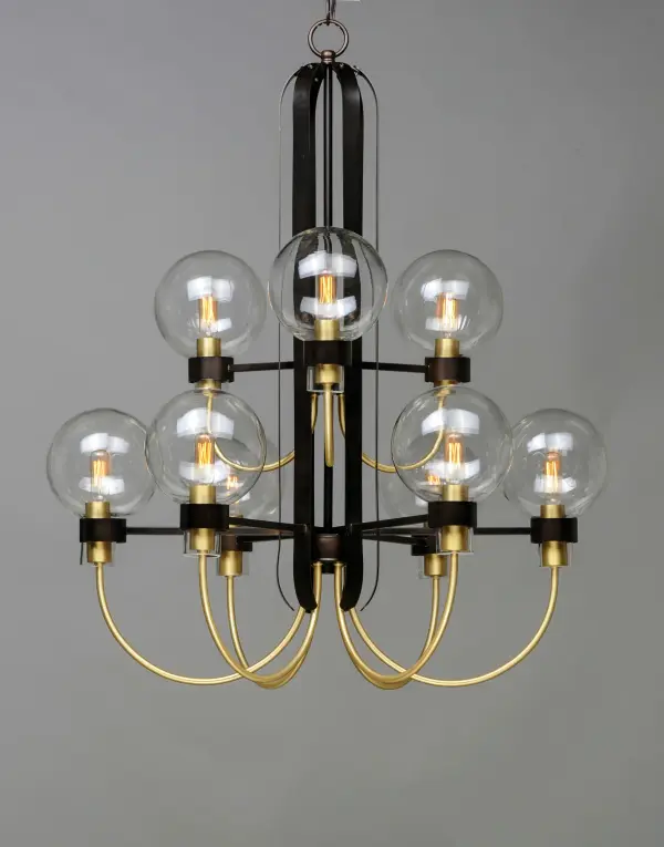 This classic Mid Century Modern design features a frame finished in a combination of Bronze and Satin Brass. The arms terminate at rings that support Clear heavy blown glass shades which were prevalent in this era. - alternate view