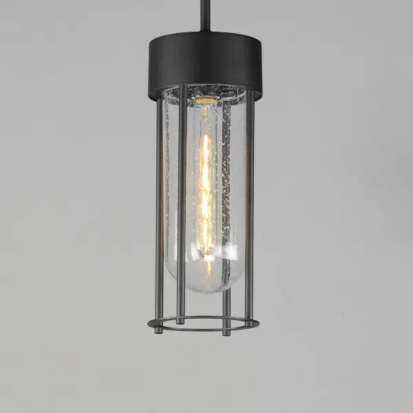 Clean and contemporary, this series of wet location rated outdoor sconces features a capsule of Clear Seeded glass encased within a cage of matte Black outdoor rated powder coat. The transitional appeal of the design pairs well in applications both modern and traditional. Complete the look with a tubular filament lamp. - alternate view
