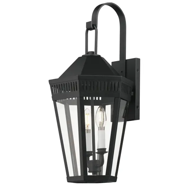 Stately lanterns with perforated filigree along the hood casts a beautiful lighting effect. Finished in Matte Black, the collection is available in multiple sizes as well as flush mount, deck lantern, and two sizes of pendants.