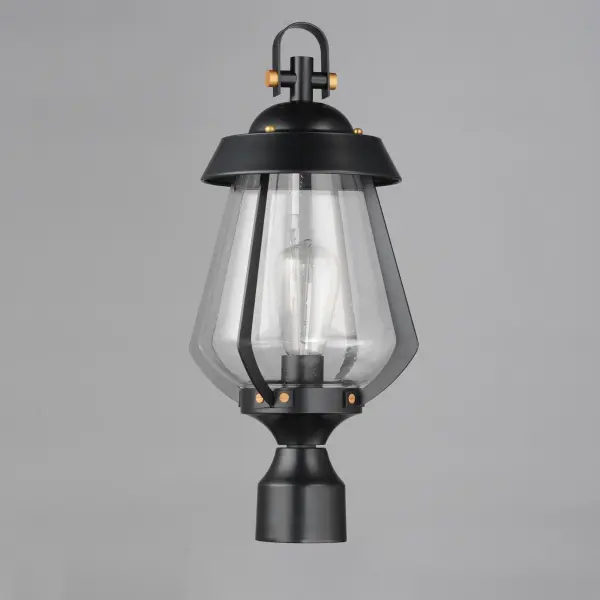 A nod to the nautical, the Marin outdoor sconces feature a two-tone frame of Black with Antique Brass details. Within the frame a pear shaped Clear Seeded glass shields a medium base lamp from the elements. Available in three sizes of sconce, two pendant configurations, and a post mount the collection is a full range of offering of a distinctive, designer look. - alternate view
