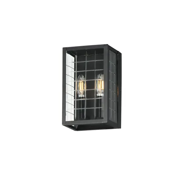 A simple square-framed lantern features deep etched squares on Clear glass, creating a captivating array of refracted light. Constructed from die-cast aluminum and finished in Matte Black, the design blends classic elements with a refreshing, modern approach, offering both sophistication and simplicity with an emphasis on minimalism.