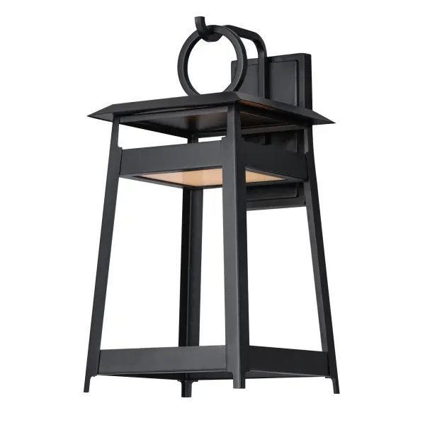 An impactful shrine of light, the modern lantern designs of the Pagoda series feature a stacked structure with slanted roof lines over an open pavilion free of glass. The LED light source is contained in the lower structure provides ample light downwards in addition to casting light upwards to create a warm glow within the frame. A large, flattened ring perches above the lanterns, which are then supported by hooks on the larger sizes. The fixtures are made more robust by eliminating the use of glass panels entirely. Finished in matte Black, these outdoor sconces are stylishly contemporary.