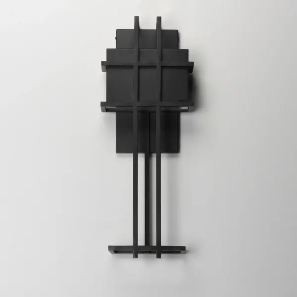 A modern interpretation of the arts & crafts movement, this anti-corrosive aluminum frame combines traditional elements with the latest technology. A concealed LED downlight, housed at the top of the frame, casts a striking pattern of light along the wall, adding depth and warmth to any space. Finished in Matte Black, this fixture seamlessly blends timeless design with modern innovation. - alternate view