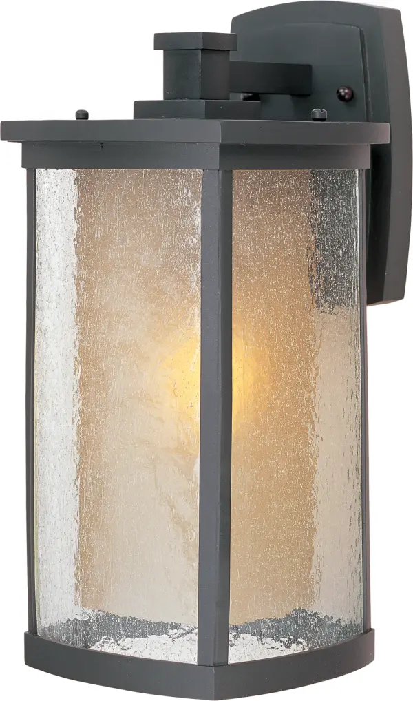 The craftsman inspired Bungalow outdoor cast aluminum collection is finished in Bronze. The exterior Seedy glass adds texture while the interior Wilshire glass adds warmth. Bungalow is also available with energy-efficient fluorescent light in the Bungalow EE collection.