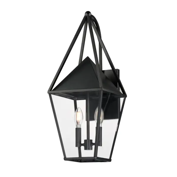An exaggerated openwork framed steeple adds vertical qualities on a sharp-lined Matte Black lantern frame. Blending modern concepts with forms that evoke a whimsical imagery, this collection presents a transitional styling for outdoor spaces.