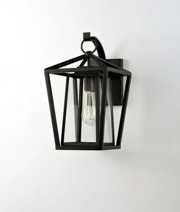 This frame inside a frame design is the perfect update to this classically inspired outdoor lantern. Durable stainless steel construction is finished in Black and supports an inner frame of Clear panels of glass for a crisp and clean appearance. - alternate view