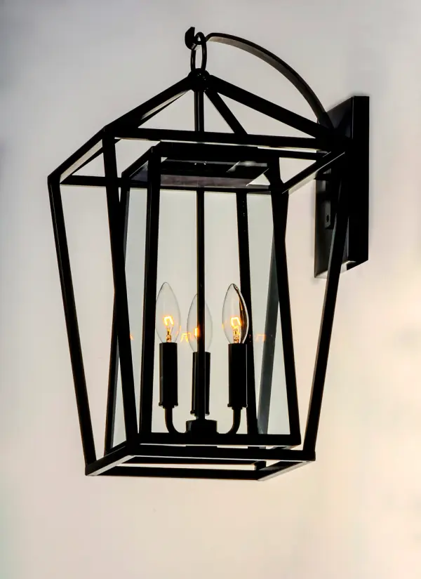 This frame inside a frame design is the perfect update to this classically inspired outdoor lantern. Durable stainless steel construction is finished in Black and supports an inner frame of Clear panels of glass for a crisp and clean appearance. - alternate view
