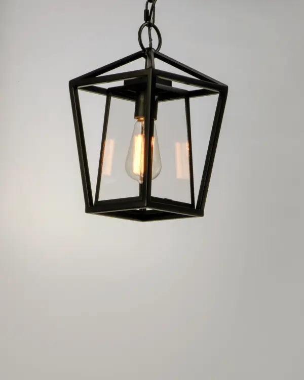 This frame inside a frame design is the perfect update to this classically inspired outdoor lantern. Durable stainless steel construction is finished in Black and supports an inner frame of Clear panels of glass for a crisp and clean appearance. - alternate view