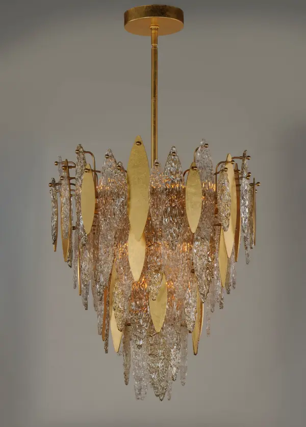 Hand-formed glass petals of Clear and Champagne-tint suspend from a tiered frame of gold and accented with petals of solid metal finished in Gold Leaf. Numerous candelabra sockets are strategically placed within the fixture to create glimmer and elegance to this majestic collection. - alternate view