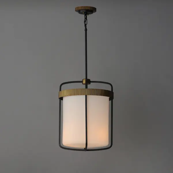 Featuring ridged collars of Antique Brass on a matte Black frame, the design of this series of chandeliers, pendants, semi-flush mounts and sconce lighting offers a transitional and stately companion to fixtures in coordinating finishes. The lighting is diffused through a rounded cylinder of Satin White glass that softly spreads illumination. - alternate view