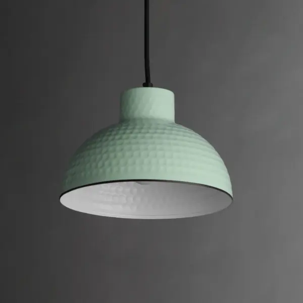 Hammered metal dome shades are painted in glossy enamel paints that welcomes a nautical look. Available in Sage Green with a glossy white interior or Glossy Black with an Antique Copper interior, these pendants embody a nostalgic element that prevails along coastline bungalows and cottages Black Rayon fabric cord adds designer details to the overall construction. Available in ten inch and twelve-inch diameters. Collection: Rockport Finish: Sage Green Width: 10.00" Height: 7.25" Length: 10.00" Weight: 2.20 lb Wire: 120" Canopy: 5"x5"x0.75" Number of Bulbs: 1 Maximum Wattage: 60.00 W Bulb Type: E26 Bulb Base: E26 Medium Light Source: Incandescent Dimmable Voltage: 120.00 V Material: Steel Safety Listing: cULus Safety Rating: Dry Spec Sheet Instructions - alternate view