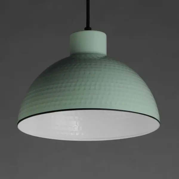 Hammered metal dome shades are painted in glossy enamel paints that welcomes a nautical look. Available in Sage Green with a glossy white interior or Glossy Black with an Antique Copper interior, these pendants embody a nostalgic element that prevails along coastline bungalows and cottages Black Rayon fabric cord adds designer details to the overall construction. Available in ten inch and twelve-inch diameters. Collection: Rockport Finish: Sage Green Width: 12.00" Height: 8.50" Length: 12.00" Weight: 2.86 lb Wire: 120" Canopy: 5"x5"x0.75" Number of Bulbs: 1 Maximum Wattage: 60.00 W Bulb Type: E26 Bulb Base: E26 Medium Light Source: Incandescent Dimmable Voltage: 120.00 V Material: Steel Safety Listing: cULus Safety Rating: Dry Spec Sheet Instructions - alternate view