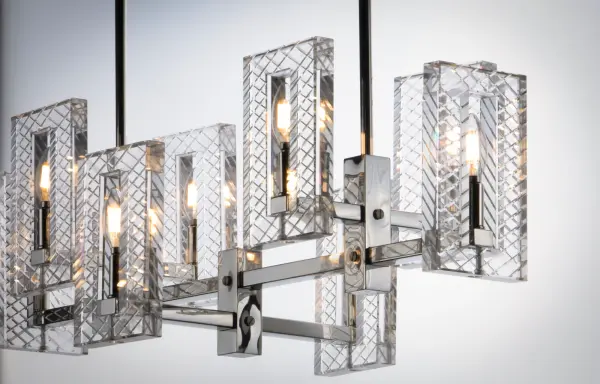Solid blocks of Clear optic crystal are etched and carved and supported by contemporary frames finished in a lustrous Polished Chrome. The high polished frame compliments and enhances the beauty of these hand crafted crystal blocks. - alternate view
