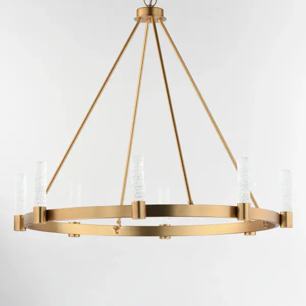 The Duchess collection seamlessly blends traditional brass craftsmanship with modern piastra-style Iceberg glass, illuminated by integrated LED modules. Powered by a commercially rated LED driver with 120-277V input, the low-voltage LEDs deliver a neutral 3000K color temperature. The rectangular tubing frame in Natural Aged Brass softens the contemporary aesthetic, while decorative flat-edge chain links add a touch of elegance. A dual-mount canopy offers flexibility for shorter height profiles or field-adjustable lengths with the included chain. - alternate view