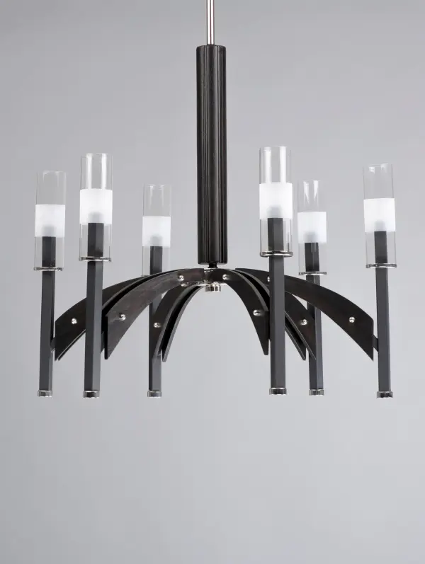 A modern classic created using mixed medium in complimentary finishes that come together to compose a beautiful art form. Available in your choice of Wenge wood with Black and Polished Nickel accents or Antique Pecan wood with Bronze and Satin Brass. Tall Clear glass cylinders with a frosted band complement the scale of the design. - alternate view