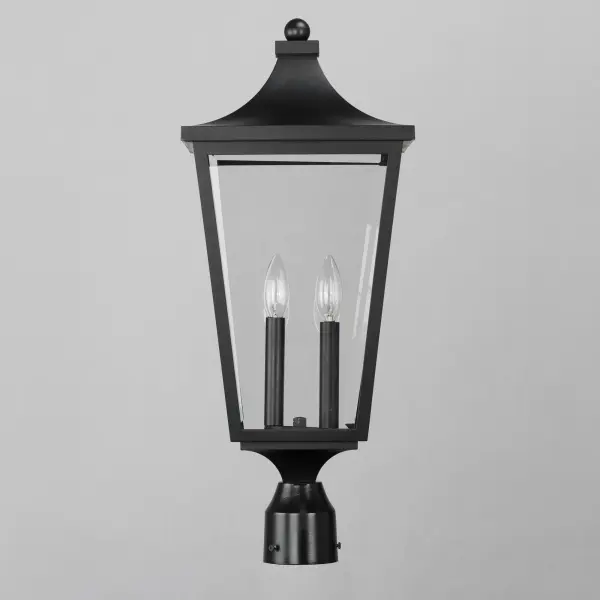 Stately outdoor sconces reference classic lantern shapes and are constructed of Maxim's proprietary Vivex composite, a robust weather-resistant materials guaranteed to withstand harsh weather climates. Available in several sizes and illuminated with clusters of candle sockets, this is a timeless design built to last. - alternate view