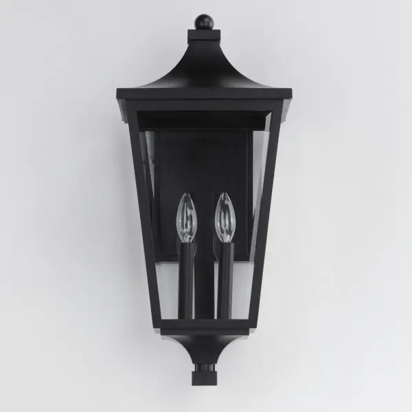 Stately outdoor sconces reference classic lantern shapes and are constructed of Maxim's proprietary Vivex composite, a robust weather-resistant materials guaranteed to withstand harsh weather climates. Available in several sizes and illuminated with clusters of candle sockets, this is a timeless design built to last. - alternate view