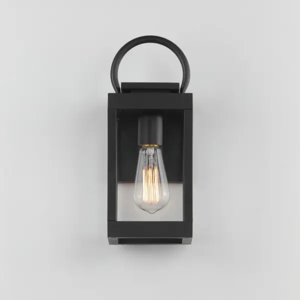 Using our proprietary Vivex material developed for use in harsh climates, the Nassau series presents Coastal styling, historical in design, made of an appropriately specified material for just this application. Available in your choice of solid Black or a cool combination of White with Black accents, the lanterns protect clusters of candelabras with clear glass panels. Add filament lamps to the lanterns to complete the look. - alternate view