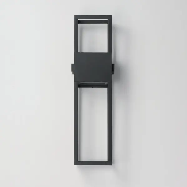 A study in simplicity, Strand VX reimagines the outdoor lantern with clean architectural lines and an open, glass-free design. Twin vertical bars form a geometric frame that cradles the hood above--now available in expanded sizes that include new up and down light configurations for enhanced illumination. Crafted from Maxim's proprietary Vivex composite, this durable fixture withstands the toughest environments, from coastal humidity to intense UV exposure. Finished in Matte Black, the fixture features discreet, high-output LED modules recessed in the hood and base, casting a focused beam upward and downward while preserving dark sky compliance. The result is a striking silhouette that blends modern minimalism with long-lasting performance. - alternate view