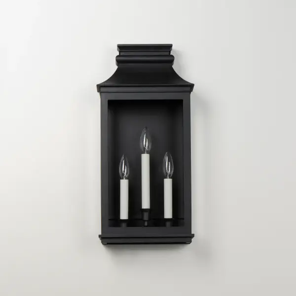 Inspired by classic colonial design, these climate-tough pocket sconces offer traditional charm and stylish finish combinations. Clear glass allows unobstructed light output and visibility into the sconces with candlesticks that stand out in their off-white finish. While the outer frame is made in a textured Black Oxide finish, the interior plate is finished either in a matching finish or contrasting Antique Copper or Verdigris finish. Available as a one, two, or three-light wall sconce, this offering of pocket sconces presents another style of Vivex outdoor products complementing more traditional exteriors. - alternate view