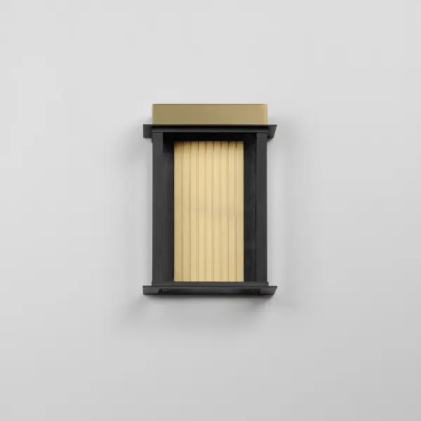Clean lines and Clear glass form the structure similar to a classic coach lantern. Produced of 304 Grade Stainless Steel and Aluminum, the Rincon set of LED outdoor sconces suit a variety of aesthetics both modern and traditional. Finished in a vibrant two-tone black and gold finish, these sconces are sure to provide updated curb appeal to your exterior. - alternate view