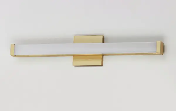This minimalistic contemporary approach to LED vanity lighting will be the standard for both residential and commercial applications. The light engine features a high quality dimmable driver with multi volt input and high color rendering LEDs for the ultimate vanity lighting. Collection: Spec Finish: Gold Width: 24.00" Height: 1.75" Length: 2.25" Weight: 2.04 lb Extension from Wall: 2.25" Wire: 8" Canopy: 4.75"x4.75" Bulbs Included Number of Bulbs: 1 Maximum Wattage: 16.00 W Bulb Type: PCB Bulb Base: PCB Integrated Light Source: LED Light Output: 1250.00 lm Color Temperature: 3000 K CRI: 90 Rated Average Life: 50000 Voltage: 120.00 V Material: Aluminum, Acrylic Safety Listing: cETLus Safety Rating: Damp ADA LED Manufacturer Warranty: 5 Spec Sheet Instructions Parts Diagram - alternate view