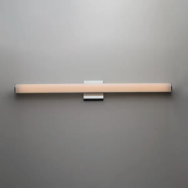 Tubular shaped White acrylic diffusers mount to frames of Polished Chrome, Satin Nickel, or Black. Powered by 3000K LED these fixtures work well in a variety of contract applications. Collection: Rail Finish: Polished Chrome Width: 30.00" Height: 4.75" Length: 30.00" Weight: 2.31 lb Extension from Wall: 2.50" Wire: 8" Canopy: 4.75"x4.75" Bulbs Included Number of Bulbs: 1 Maximum Wattage: 20.00 W Bulb Type: AC Bulb Base: Dedicated Light Source: LED Light Output: 1690.00 lm Color Temperature: 3000 K CRI: 90 Rated Average Life: 50000 Voltage: 120.00 V Material: Aluminum, Acrylic Safety Listing: cETLus Safety Rating: Damp ADA Title 24 LED Manufacturer Warranty: 5 Spec Sheet Instructions Parts Diagram - alternate view