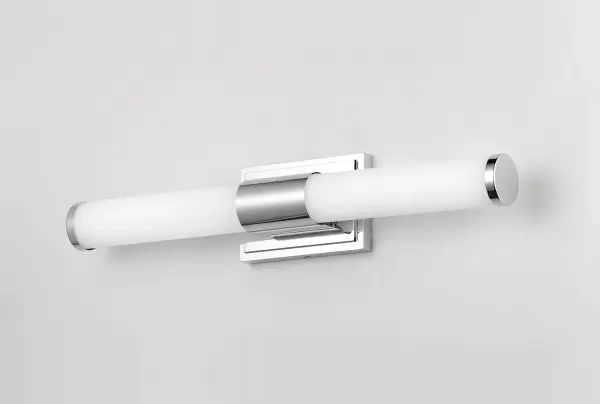 Cylinders of White cased glass are mounted onto a cast aluminum frame of Satin Nickel or Polished Chrome. LED modules evenly illuminate and provide soft yet ample illumination. Multi volt input is standard which allows for installation into commercial applications. - alternate view