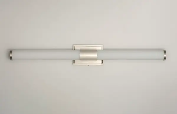 Cylinders of White cased glass are mounted onto a cast aluminum frame of Satin Nickel or Polished Chrome. LED modules evenly illuminate and provide soft yet ample illumination. Multi volt input is standard which allows for installation into commercial applications. Collection: Optic Finish: Satin Nickel Glass: White Width: 36.00" Height: 4.75" Length: 36.00" Weight: 5.43 lb Extension from Wall: 3.50" Wire: 8" Canopy: 4.75"x7" Bulbs Included Number of Bulbs: 1 Maximum Wattage: 24.00 W Bulb Type: PCB Bulb Base: PCB Integrated Light Source: LED Light Output: 1850.00 lm Color Temperature: 3000 K CRI: 90 Rated Average Life: 50000 Voltage: 120.00 V Material: Aluminum, Glass Safety Listing: cETLus Safety Rating: Damp ADA Title 24 LED Manufacturer Warranty: 5 Spec Sheet Instructions Parts Diagram - alternate view