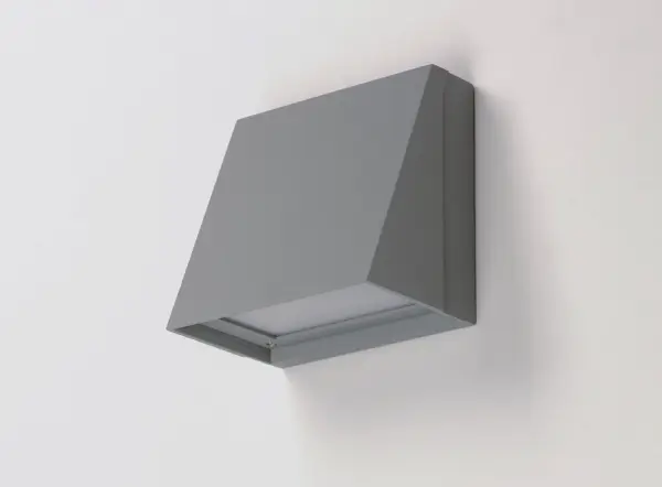 With solid Die-Cast Aluminum construction and powered by a range voltage input driver, Pathfinder is a high performance down light for commercial and residential installations. Choose from a variety of sizes, shapes that are sharply angled or smoothly sloping, and various photocell and motion sensor options. Also available with enabled switch to toggle between 5 light Color Temperature settings, this popular sconce has even more versatility. Choose from Black, Architectural Bronze, or Metallic Sliver outdoor-rated powder coat finishes. Collection: Pathfinder Finish: Silver Width: 5.50" Height: 5.50" Length: 4.00" Weight: 2.03 lb Extension from Wall: 4.00" Wire: 8" Canopy: 5.5"x5.5" Bulbs Included Number of Bulbs: 1 Maximum Wattage: 15.00 W Bulb Type: PCB Bulb Base: PCB Integrated Light Source: LED Light Output: 820.00 lm Color Temperature: 3000 K CRI: 90 Dimmable Voltage: 120.00 V Material: Aluminum,Glass Safety Listing: cETLus Safety Rating: Wet ADA Dark Sky LED Manufacturer Warranty: 5 Spec Sheet Instructions Parts Diagram - alternate view