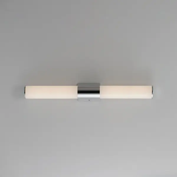 A tube of light extends in both directions in this clean and contemporary LED wall sconce. Available in various lengths and finishes, the fixture can either be mounted directly from its frame on a single gang box or with the use of the five inch cover plate provided for standard junction boxes. Select from 5 different color temperatures using an easily accessible switch on the frame. Collection: Tubo Finish: Polished Chrome Glass: White Width: 24.00" Height: 3.00" Length: 24.00" Weight: 1.68 lb Extension from Wall: 3.50" Wire: 6" Canopy: 6"x6" Bulbs Included Number of Bulbs: 1 Maximum Wattage: 24.00 W Bulb Type: LED Bulb Base: Integrated Light Source: LED Light Output: 1700.00 lm Color Temperature: 2700 K CRI: 90 Rated Average Life: 50000 Voltage: 120.00 V Material: PMMA Acrylic, Aluminum Safety Listing: cETLus Safety Rating: Damp Energy Efficient ADA Title 24 LED Manufacturer Warranty: 5 Spec Sheet Instructions - alternate view