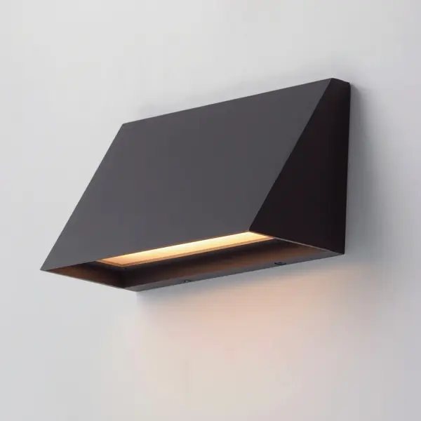 With solid Die-Cast Aluminum construction and powered by a range voltage input driver, Pathfinder is a high performance down light for commercial and residential installations. Choose from a variety of sizes, shapes that are sharply angled or smoothly sloping, and various photocell and motion sensor options. Also available with enabled switch to toggle between 5 light Color Temperature settings, this popular sconce has even more versatility. Choose from Black, Architectural Bronze, or Metallic Sliver outdoor-rated powder coat finishes. - alternate view